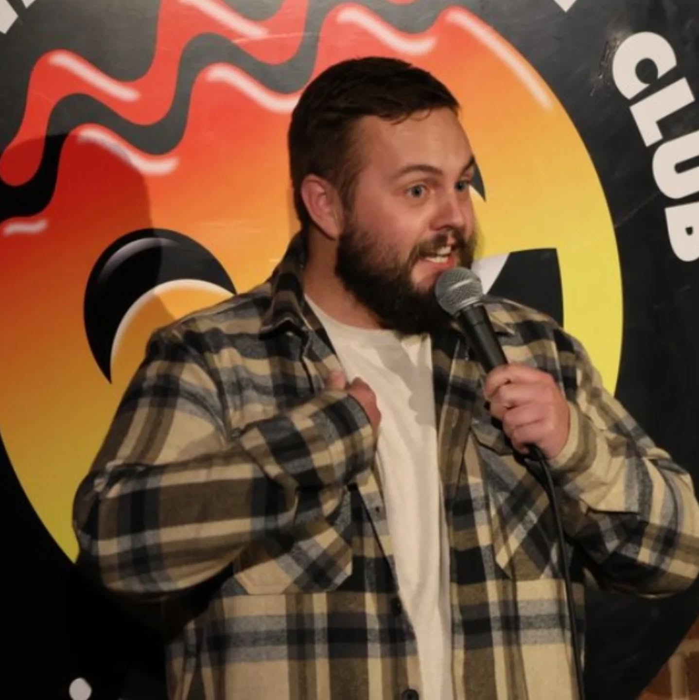 Jamie on stage at Hot Water Comedy Club, Liverpool