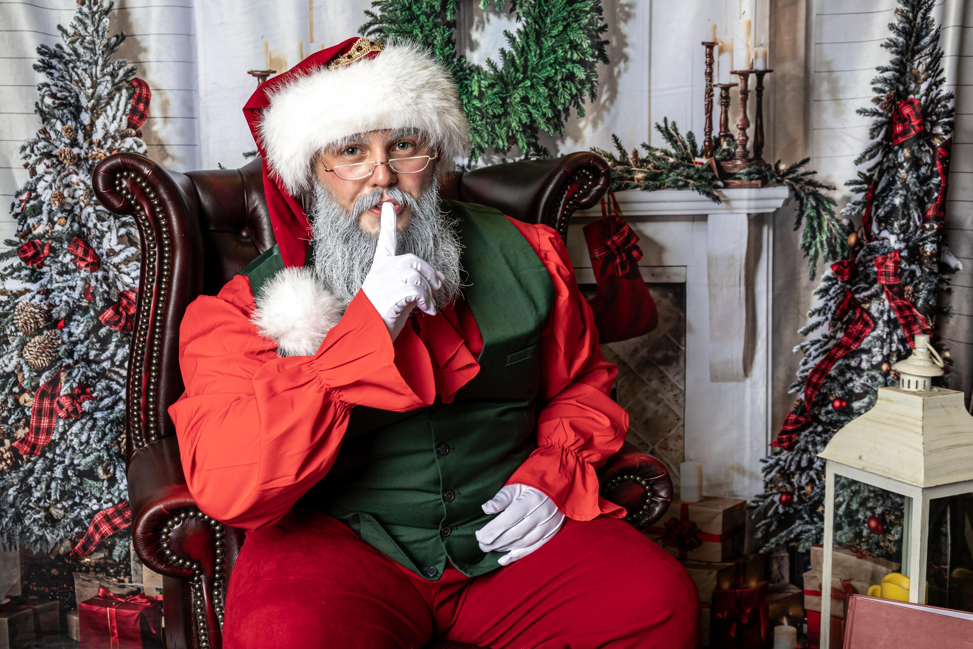 Santa Jamie seated in his Christmas setting